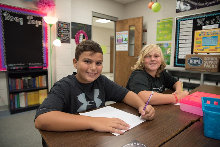 5th graders Vance Barker (left) and Tyler Mason (right) working hard on the first day of school at Pelham Oaks Elementary.