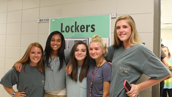 Pelham High School brought PHS Peer Helpers and incoming freshman together at Thursday night's registration. Peer Helpers Addison Fuller and Anna Grace Hall are the bookends in this photo surrounding incoming PHS freshmen Hallie Burnett, Sammie Abbott, and Tanya Ruimin. (Contributed)