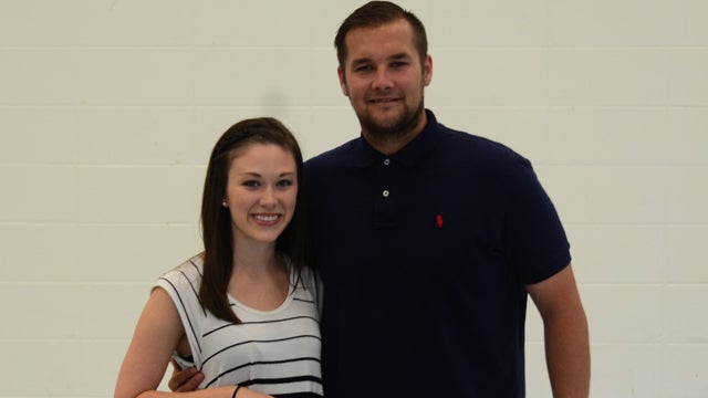 Chris Blight, shown here with his wife, has taken over as the head girls’ soccer coach at Oak Mountain High School. (Reporter Photo / Baker Ellis)