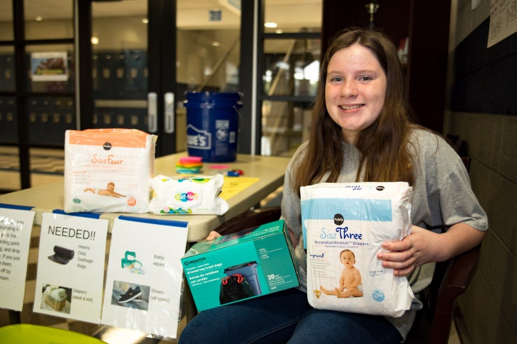 Allyson Partridge is collecting baby wipes, diapers, heavy-duty garbage bags and shoes to send to those impacted by flooding in Louisiana. (Reporter photo/Keith McCoy)