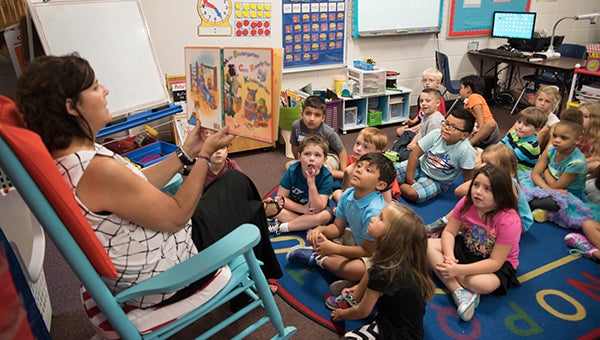 Helena Elementary School Kindergarten teacher Melissa Jarrell reads a book to her class on the first day of school on Tuesday, Aug. 9. (Reporter Photo/Keith McCoy)
