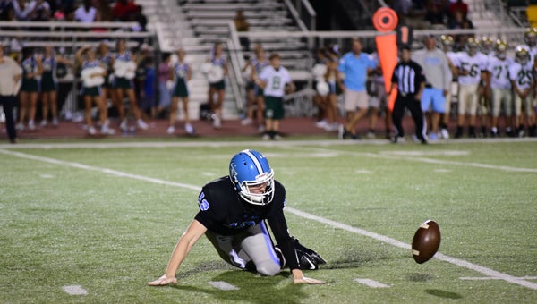 Spain Park quarterback Hunter Howell could not recover a fumbled snap in late in the second quarter of a loss to Mountain Brook. (Photos by Stephen Dawkins)