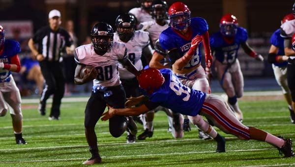 Helena’s Dionte Tolbert (80) returned a kickoff 72 yards in the second quarter in a loss to Vestavia on Friday, Sept. 23. (Reporter Photo/Keith McCoy)
