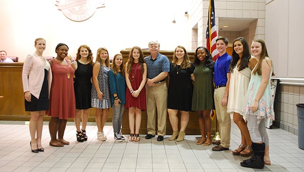 Helena Mayor Mark Hall, center, congratulates the newest members of the Helena Teen Council. The members were recognized at the Sept. 12 Helena City Council meeting. (Reporter Photo/Graham Brooks)
