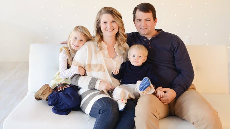 Tiffany Bell, second from left, was diagnosed with a congenital heart defect last year. She and her husband, Chris, have two children, Payton and Grayson. 